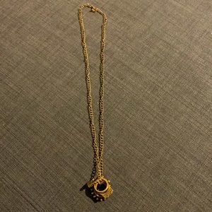 Bohemian style necklace with various dangling charms